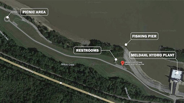 Pictured is an areal photo of the Meldahl Hydroelectric Power Plant and the park area adjacent to the facility. PROVIDED
